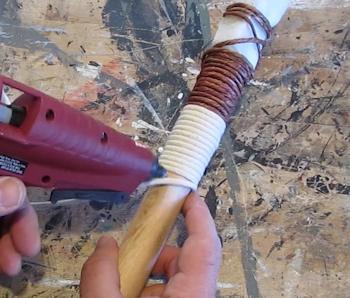 Glue the cord in place