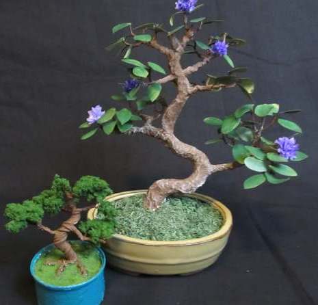 Two wire bonsai trees that are home made