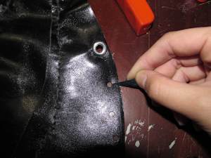 inserting eyelets