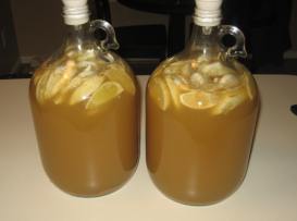 Two jugs of fermenting mead