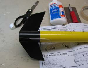 Glue fin assembly into the tube
