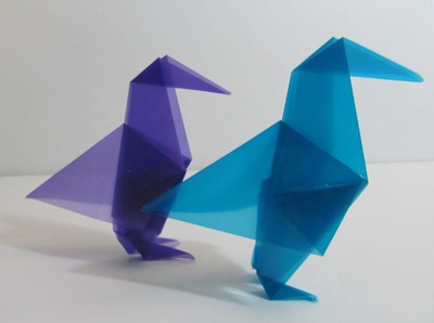 Two plastic origami birds