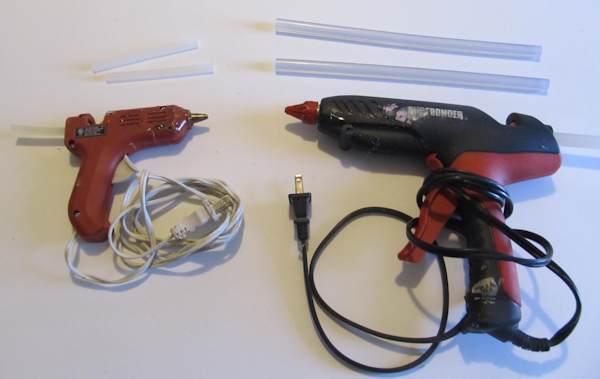 Two hot glue guns