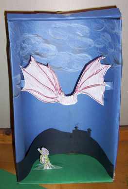 glue the wings into the shoebox 