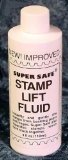 A bottle of stamp lift fluid
