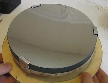 Secure the mirror with clamps
